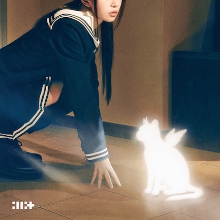 3rd EP bomb by illit cover art, a girl squating down wearing a dark blue long sleeve dress and in front of her is a glowing silhouette of a cat with fairy wings